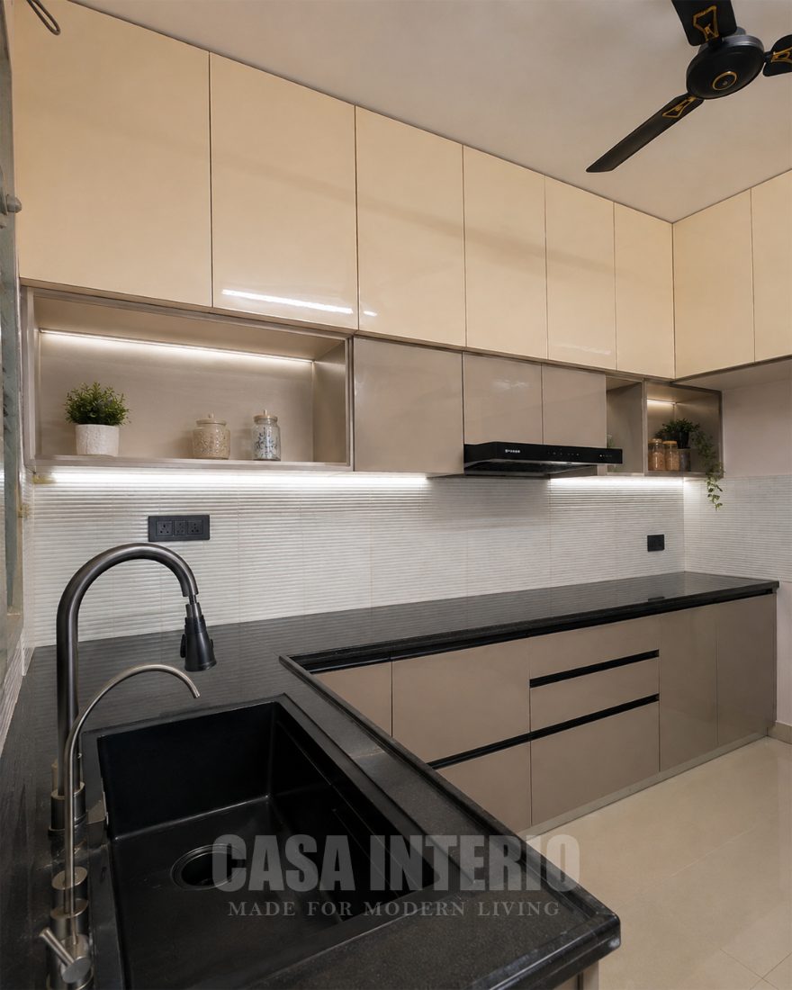 Gloss ivory kitchen with granite counter and open niches
