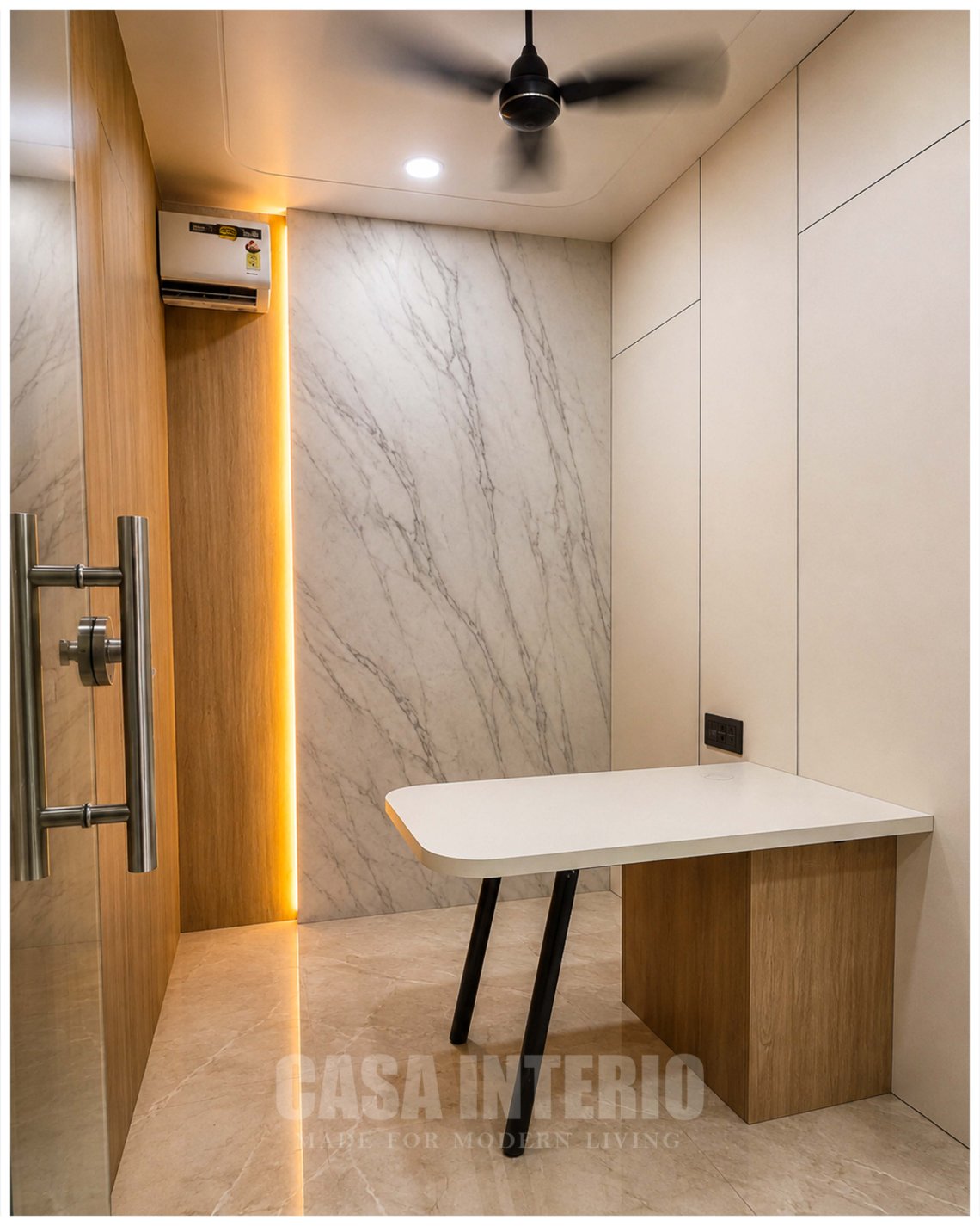 Office cabin with a marble feature wall, oak door and white desk