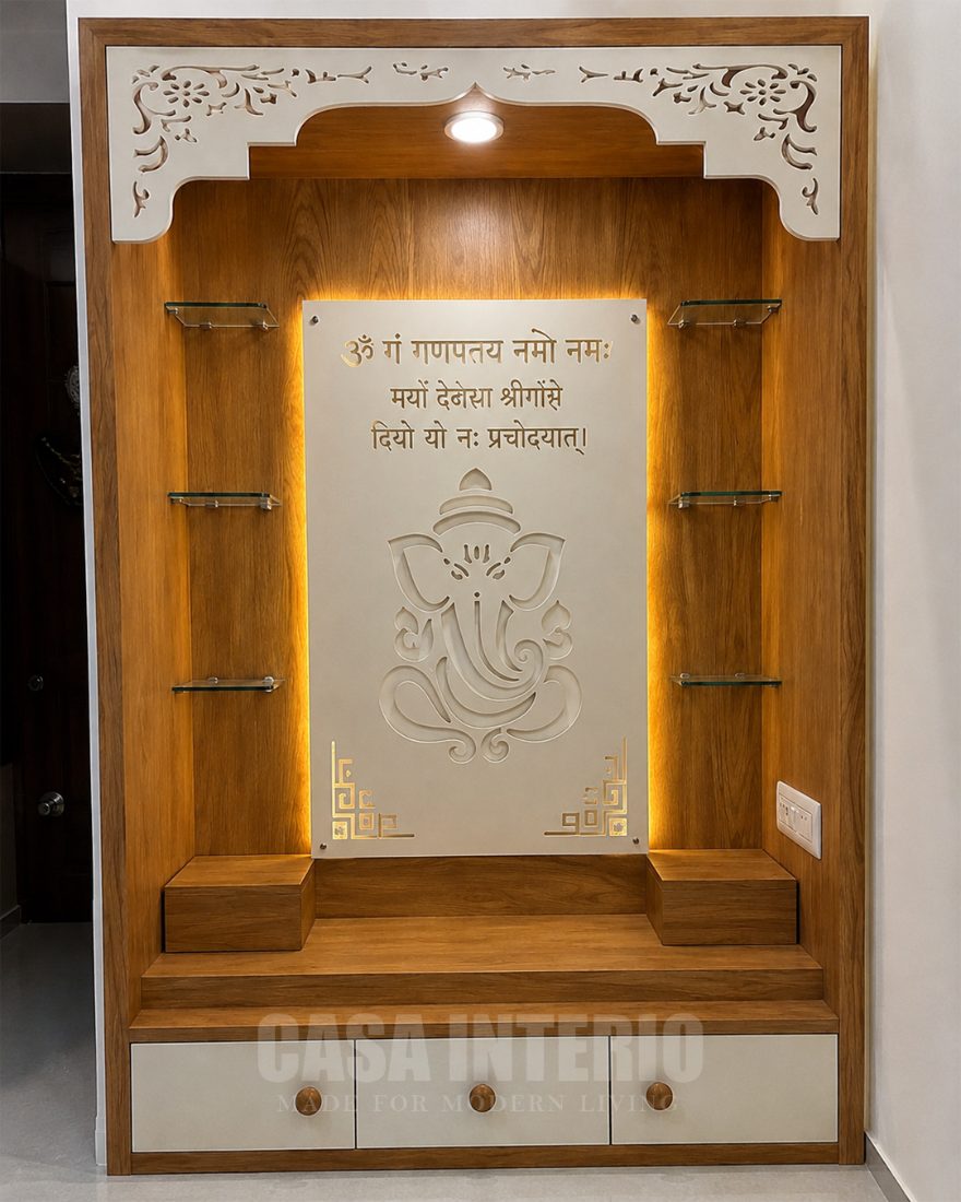 Oak mandir with glass shelves and a backlit Ganesh panel