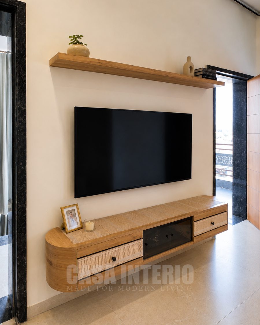 Floating television console in teak and cane